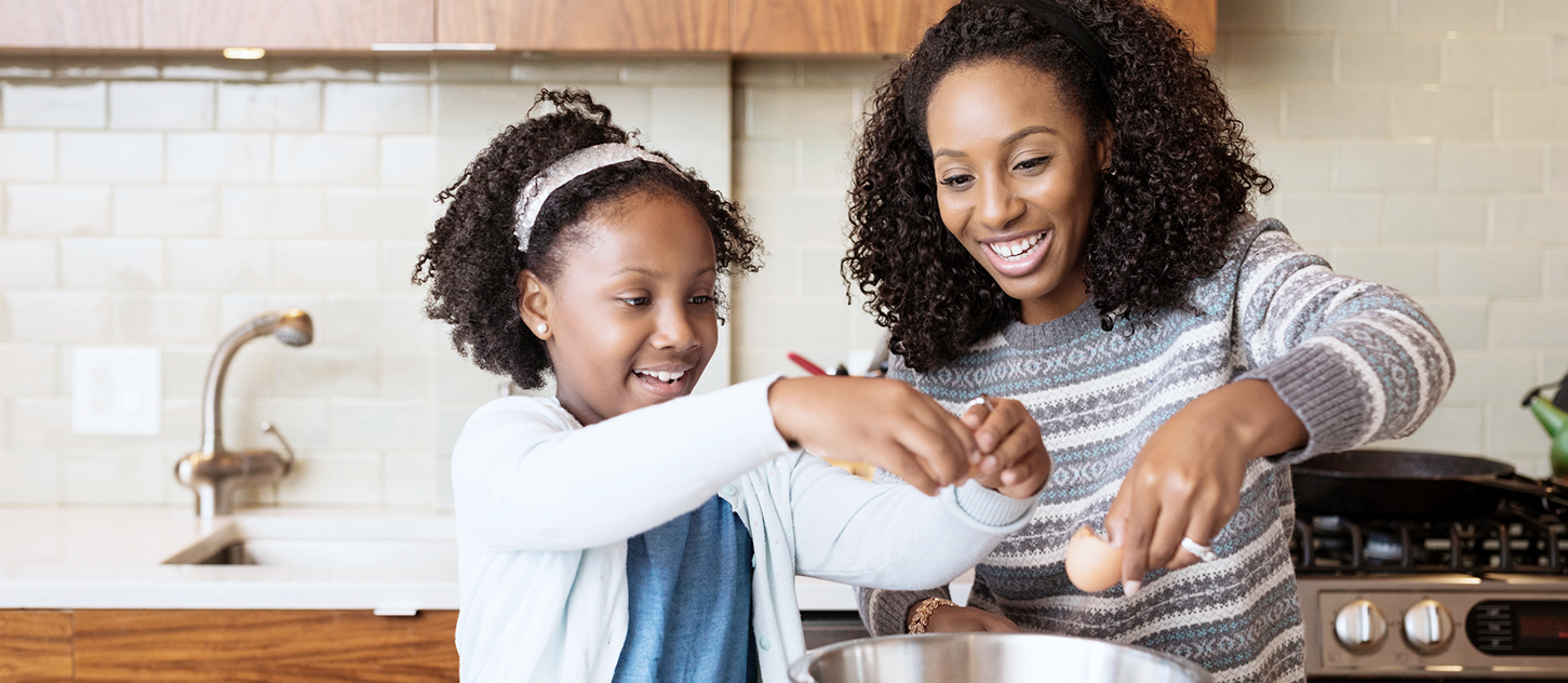 mom and daughter baking aprilaire